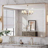 LOAAO rounded rectangle gold frame mirror offers a clear reflection for stylish bathrooms