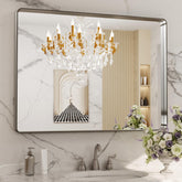 LOAAO brushed nickel bathroom mirror with 40x30 dimensions and clear reflection.