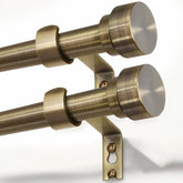 Lootkell antique bronze curtain rod extended from 32 to 144 inches for flexible sizing.