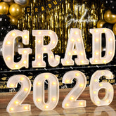 Lotus Hills GRAD 2026 letters illuminate space for photo moments.