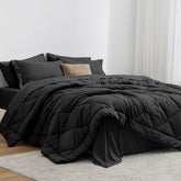 Love's cabin California King comforter black fabric close-up highlighting soft, breathable texture.