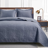 Love's cabin Cal King quilt in blue coin pattern for year-round comfort