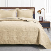 Love's cabin king quilt camel on bed for year-round comfort and style.