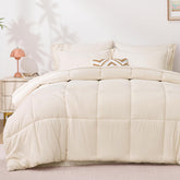 Love's cabin king-size beige comforter on bed for all-season warmth and softness.