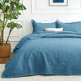Love's cabin Misty Blue King Size Quilt draped for all-season comfort