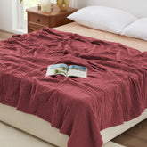 Love's Cabin six-layer muslin blanket close-up weave, breathable and skin-friendly.