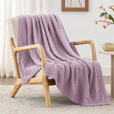 Love's cabin lavender muslin blanket on bed offers breathable comfort