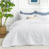 Love's cabin oversized king quilt set with coin-pattern design adds versatile year-round style.
