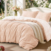 Love's cabin pink full-size comforter in a serene bedroom scene for all-season warmth.