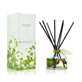 LOVSPA eucalyptus reed diffuser bottle on bathroom shelf for fresh fragrance