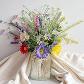 LUEUR artificial daisy and sunflower bouquet in a glass vase with twine for elegant home decor.