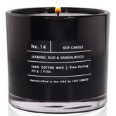Lulu Candles Jasmine-Oud-Sandalwood jar burning with a rich, inviting aroma.