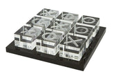 LuxLand Home modern tic tac toe acrylic XO with black base enhances contemporary living room decor.