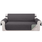 Luxshare Home reversible couch cover in dark grey with quilted texture protects upholstery