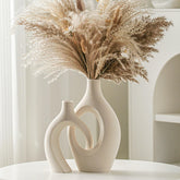 Lvases Snuggle Hollow tall cream vase with frosted texture adds chic corner decor.