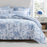 Madison Park Adele blue floral comforter set in a romantic bedroom.