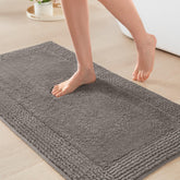Madison Park Splendor heavy 3000gsm bath rug with tufted top for plush comfort.