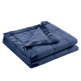 Madison Park Windom navy full-queen on bed for all-season comfort