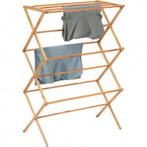 MAGIC BAMBOO collapsible drying rack extended for towels and linens.