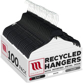 Mainetti black 17-inch recycled plastic hangers for organized shirts and dresses