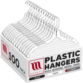 Mainetti clear plastic hangers, 17-inch width, ideal for shirts and dresses.