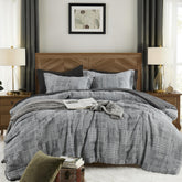 MaiRêve charcoal grey comforter set features crinkle texture for a chic focal point.