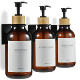 MAISONOVO amber bamboo shampoo dispenser mounted on wall for organized shower storage.