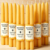 MAKALONE 12-pack beeswax taper candles box for easy gifting and home use.