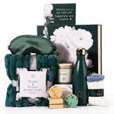 Make Me Elegant emerald green box opens to reveal a luxurious spa gift set for celebrations.