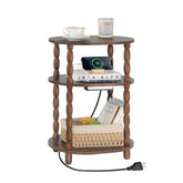 MaxSmeo side table with charging station beside a chair for easy device charging.