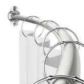 Mcrbeay curved shower rod shows elbow-space expansion for a roomier shower.