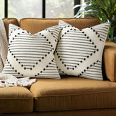 Mecatny boho pillow cover front view with tassels for stylish seating.