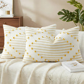 Mecatny boho tassels on yellow pillow cover for patio decor and cozy outdoor seating.
