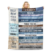 Menghao blanket on sofa offers cozy warmth for relaxing evenings.