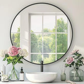 Mfring round black mirror 30-inch reflecting natural light and room depth