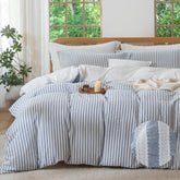 MILDLY blue striped duvet cover showcases jacquard texture for tactile luxury.