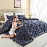MIOTO 132x120 oversized king comforter in grey provides full bed coverage and elegant drape.