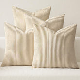 MIULEE boho farmhouse pillow covers on a neutral sofa for cozy living room styling