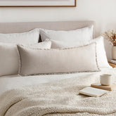 MIULEE decorative pillow cover in neutral linen fringe on sofa adds cozy farmhouse flair.