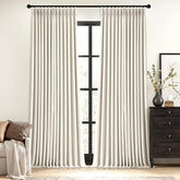 MIULEE natural pinch-pleated curtain panel blocks light and adds textured warmth.