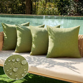 MIULEE four-pack green pillow covers on outdoor furniture, ideal for patio decor
