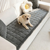 Mivnue pet couch cover with non-slip backing keeps the sofa in place during play
