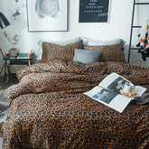 Mixinni leopard print comforter queen set close-up fabric texture for plush all-season warmth.