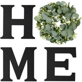 Mkono farmhouse wall sign H letter close-up, adds rustic warmth to living room.