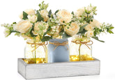 Mkono mason jar lights on wood box centerpiece with warm glow for cozy dining ambience