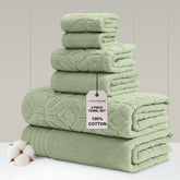 Modern Threads soft olive bath towels on a rack show plush quality for everyday luxury.