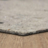 Mohawk Home felt rug pad 5x7 top view showing plush cushioning under a rug