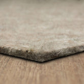 Mohawk Home felt rug pad 9x12 provides plush underfoot cushioning for added comfort.