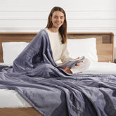 Molatink electric blanket full size in lavender on bed for cozy warmth.