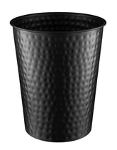 Monarch Abode hand-hammered metal wastebasket enhances décor while concealing daily trash.